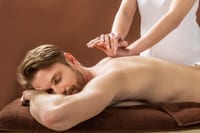 A man receiving a massage